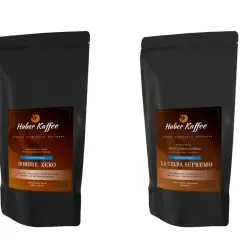 Zwei Packungen Huber Kaffee, "Hombre Zero" und "La Celba Supremo", beide koffeinfrei. Was bedeutet entkoffeiniert? Kaffee ohne Koffein, aber mit vollem Aroma.
