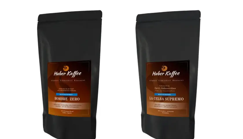 Zwei Packungen Huber Kaffee, "Hombre Zero" und "La Celba Supremo", beide koffeinfrei. Was bedeutet entkoffeiniert? Kaffee ohne Koffein, aber mit vollem Aroma.
